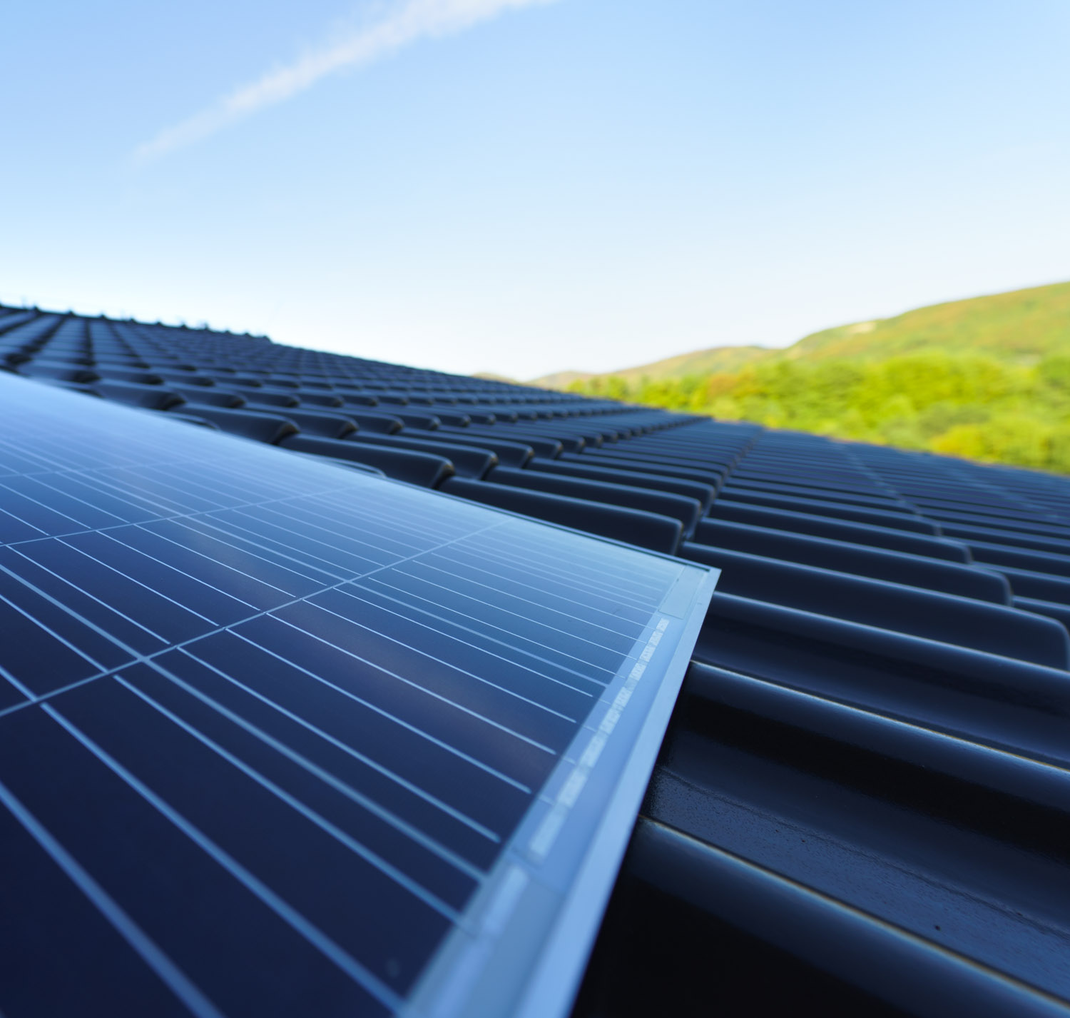 Close up of solar photovoltaic panels on roof, alternative energy, saving resources and sustainable lifestyle concept.